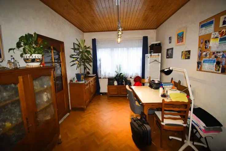 Te koop woning met duplex en gelijkvloersappartement in België