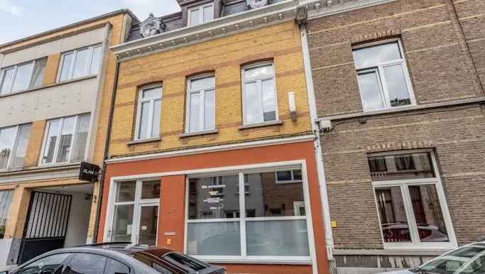 Te koop handelspand en magazijn in Deurne met duplex woonst en tuin