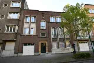 Te koop gemengd gebruik huis in Sint-Jans-Molenbeek met duplex en tuin