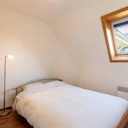 Appartement 1 slaapkamer slaaphoek terras havenzicht