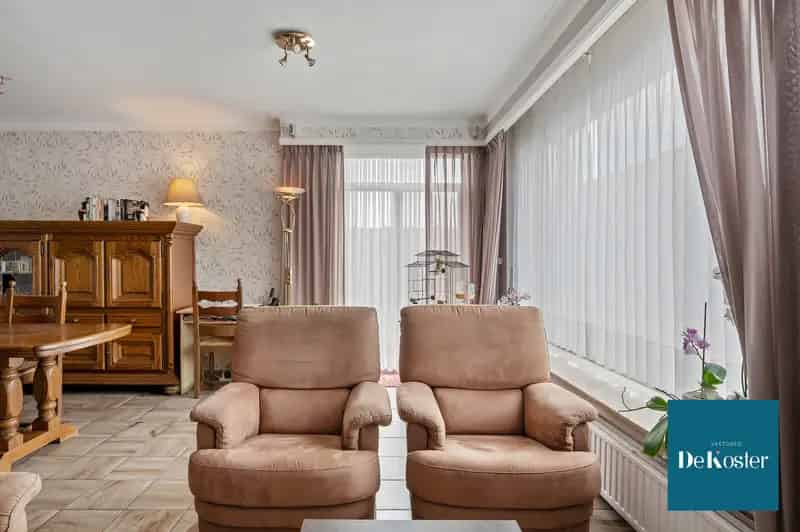 Appartement te koop: Zonnig appartement met dubbele garagebox