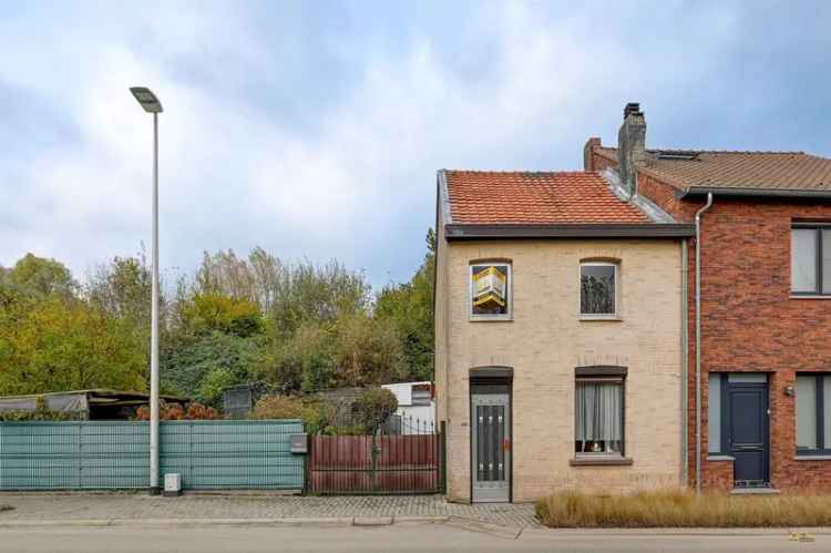 Te renoveren woning met bouwgrond