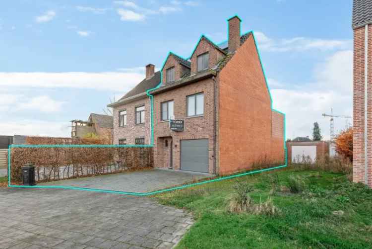 Verzorgde bel-étage met 3 SLK, garage, ZUID-terras en tuin