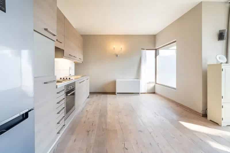 Gelijkvloers appartement 1 slaapkamer tuin autostaanplaats