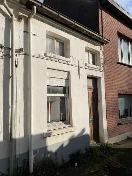 Te renoveren woning 2 slaapkamers terras  centrale ligging