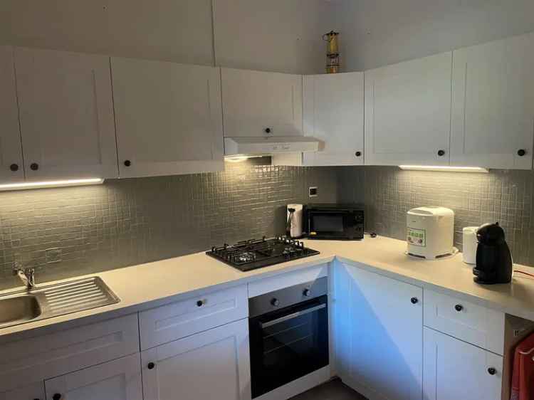 Ruime gezinswoning te Genk met 4 slaapkamers en 2 garages