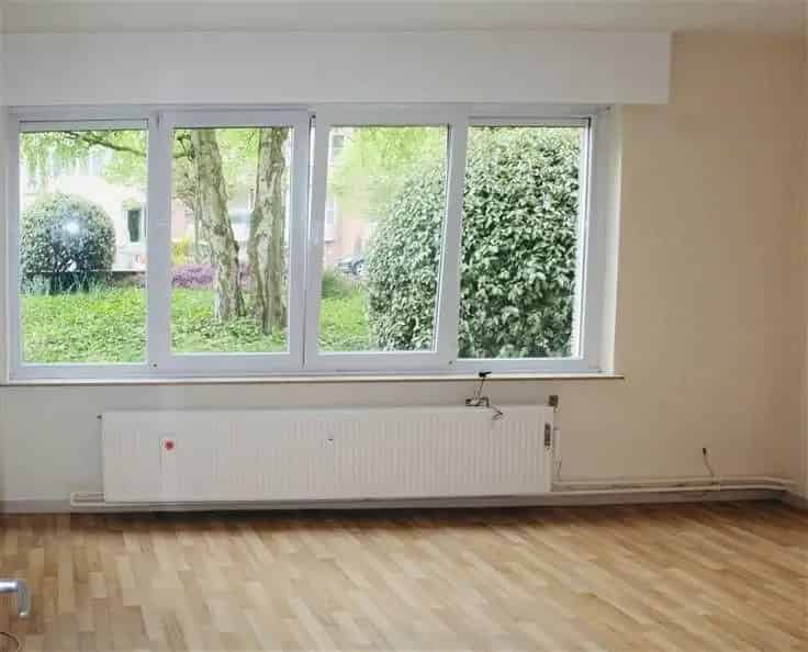 Gelijkvloerse 1 Slaapkamer Flat met Tuin te Koop