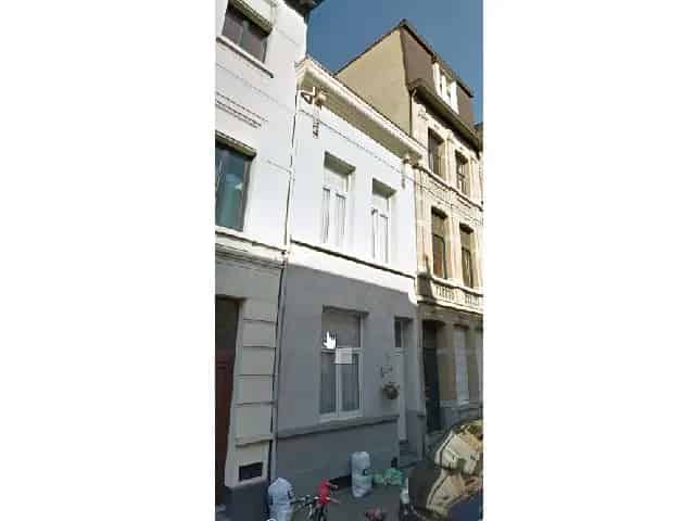Eengezinswoning Guldensporenstraat 1927 gerenoveerd 2000