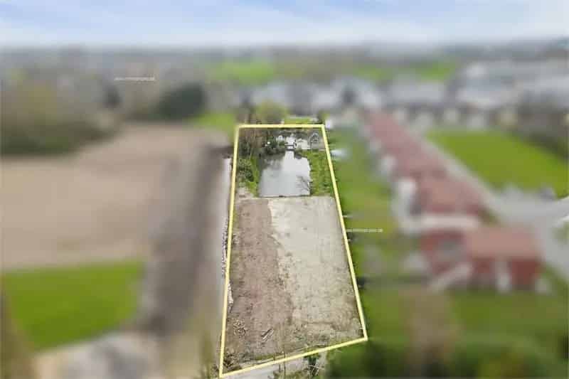 Bouwgrond Wetteren: 3381m² met Chalet en Vijver