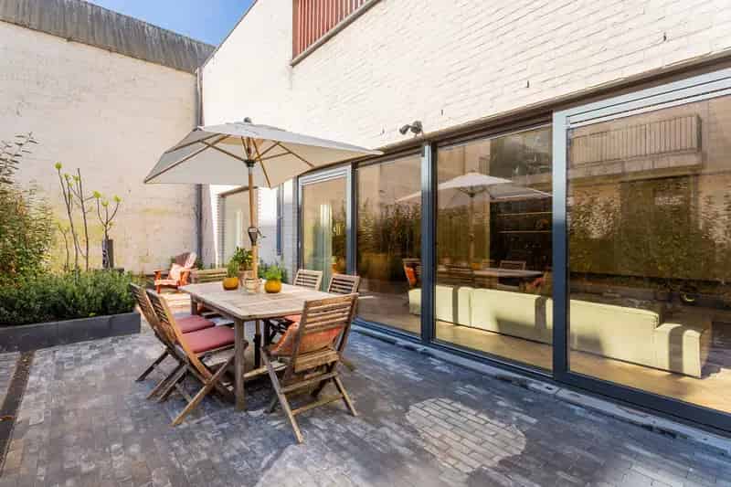 Achterhuis op 't Zuid met tuin en parking