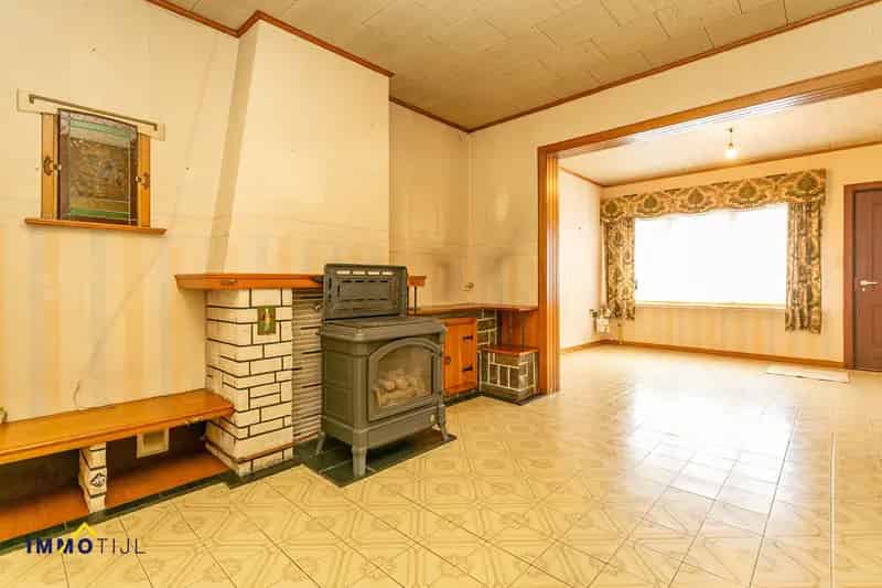 Te renoveren woning met tuin in Baasrode