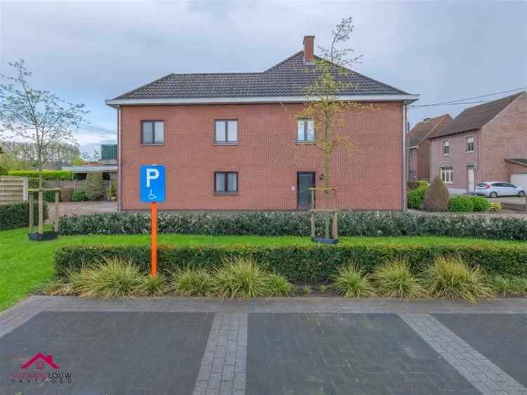 Halfopen bebouwing bestaande uit 2 appartementen