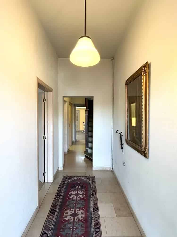 Huis te koop Kessel-Lo: Ruime Rijwoning met Potentieel