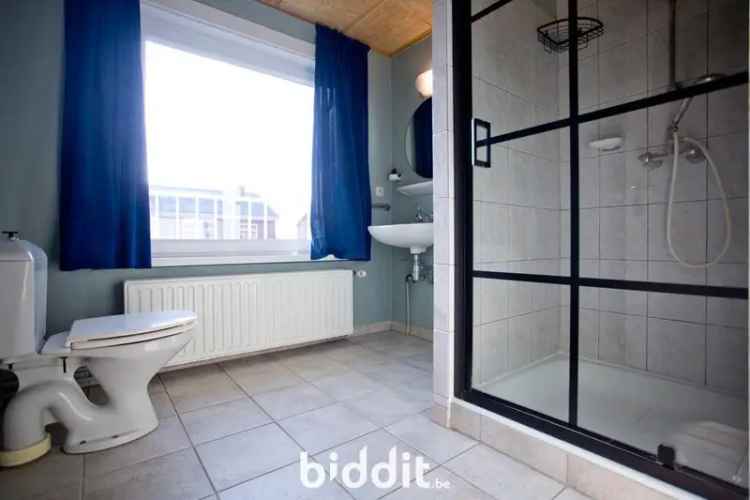 Te koop huis halfopen bebouwing rustig gelegen