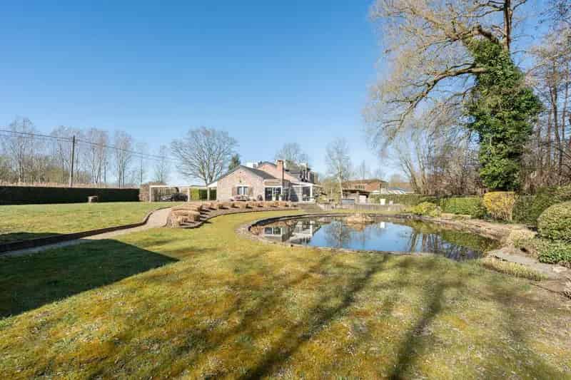 Huis te koop Wijgmaal: Charmante villa met zwembad en vijver