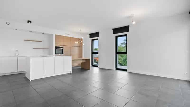 Penthouse te koop Genk 2 slaapkamers ruim terras