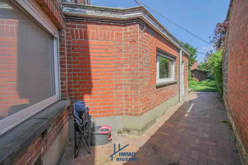 Huis te huur Wevelgem renovatieproject tuin zij-ingang