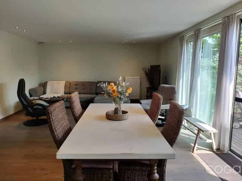 Gelijkvloers appartement met tuin te koop
