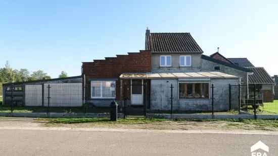 Verder op te frissen woning met 2 slpks op 11a 04ca