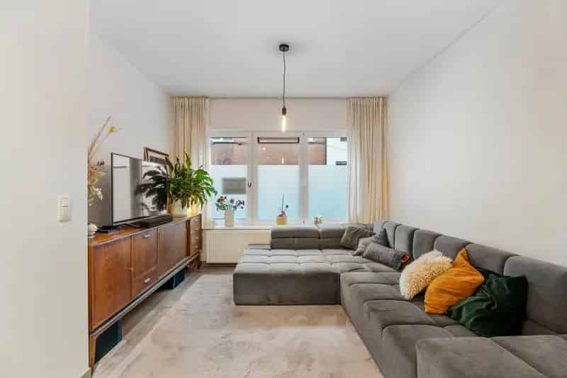 Appartement te koop: Trendy Duplex met Patio en Terras