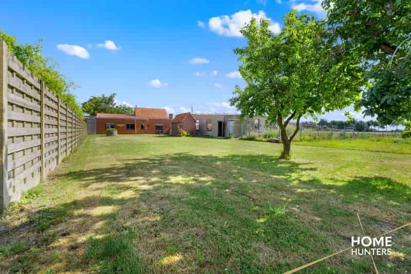 Huis te huur Heuvelland: Landelijke woning met loods en tuin