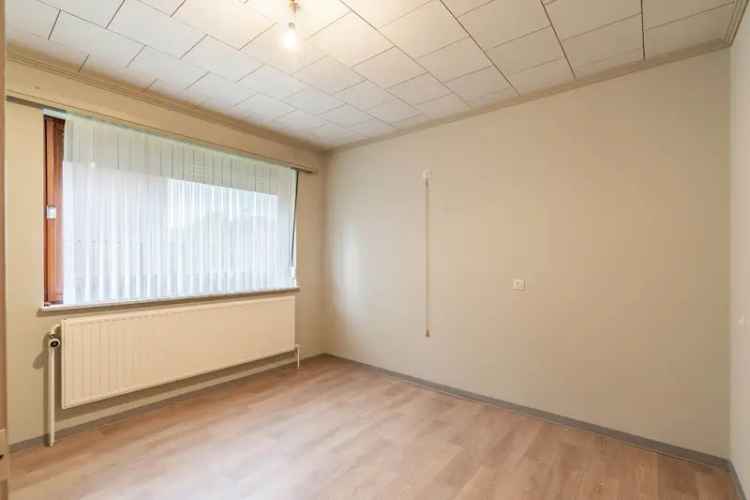 Te Koop: Te Renoveren Woning op een Perceel van 714m² in Groene Omgeving te Houthalen