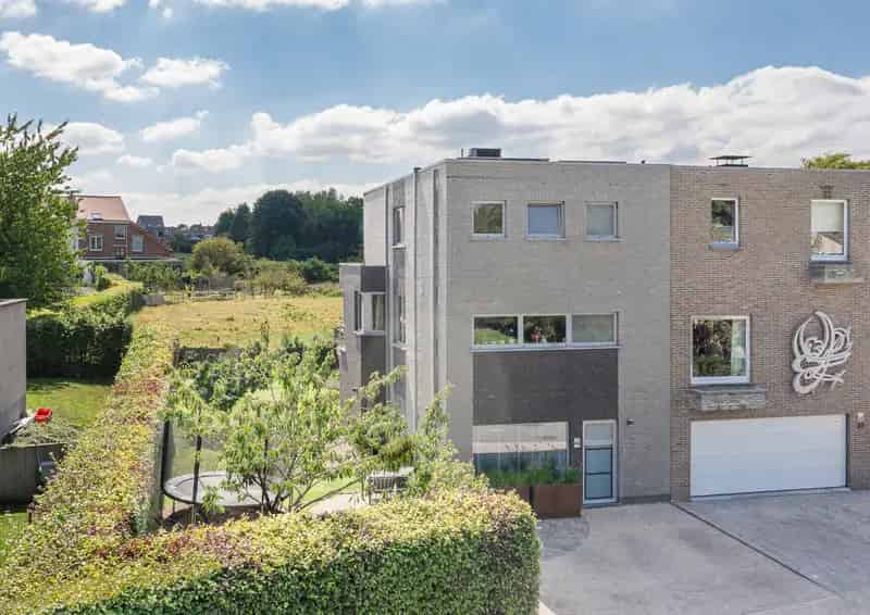 Energiezuinige en instapklare woning met atelier/burelen.