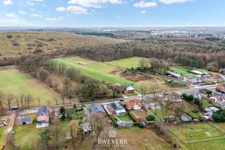 Te koop grond in Heusden-Zolder met unieke ligging en grote privacy