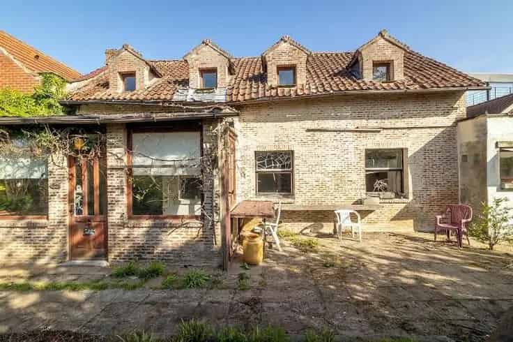 Te renoveren woning met tuin te Leuven