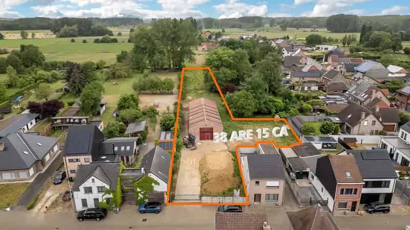 Te renoveren loods met percelen