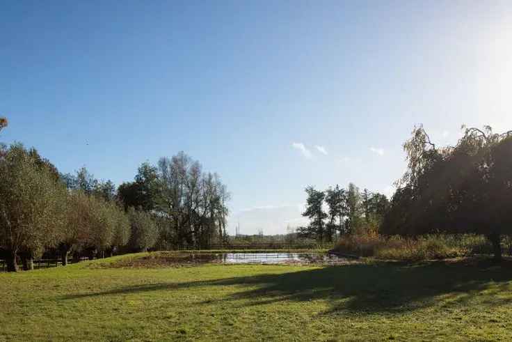 Te koop villa Waasmunster met unieke tuin en landgoed kenmerken