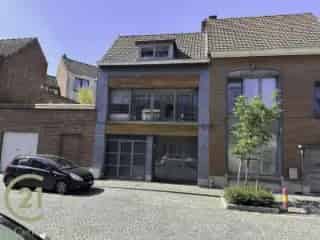 Huis te koop Doornik - gerenoveerde woning met tuin en garages