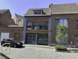 Huis te koop Doornik - gerenoveerde woning met tuin en garages