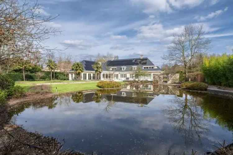 Landhuis kopen in Balen met parktuin, wellness en garages