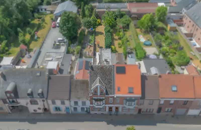 Te renoveren 5-kamer woning met tuin in centrum