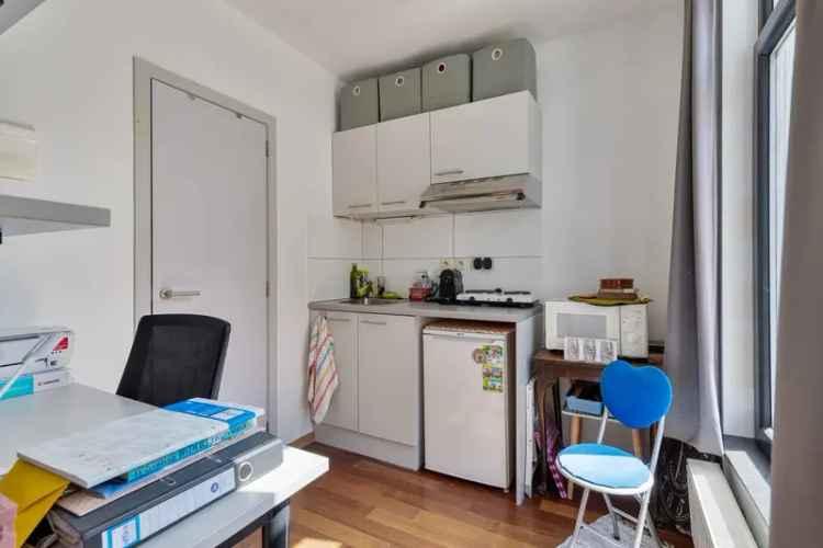 Te koop appartement studio met tuin centraal in Leuven