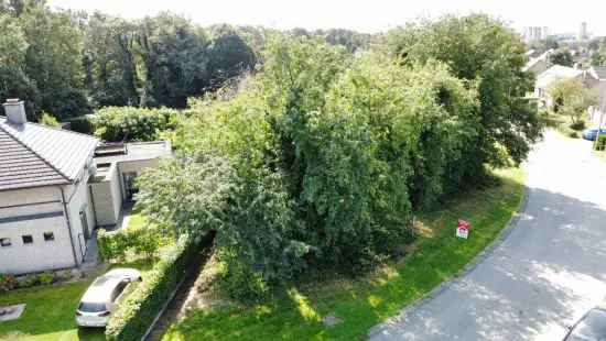 Perceel kopen in Genk met bouwmogelijkheden en rustige locatie