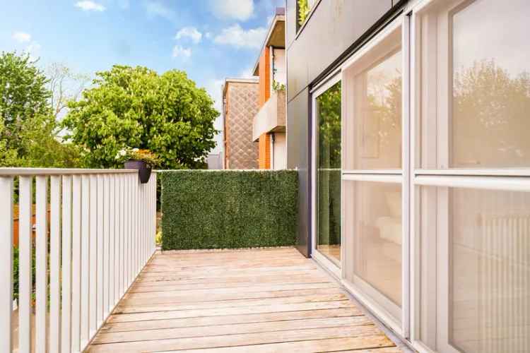 Duplex te koop met tuin en carport