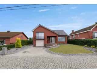 Huis te koop Herk-de-Stad - Op te frissen gezinswoning met garage