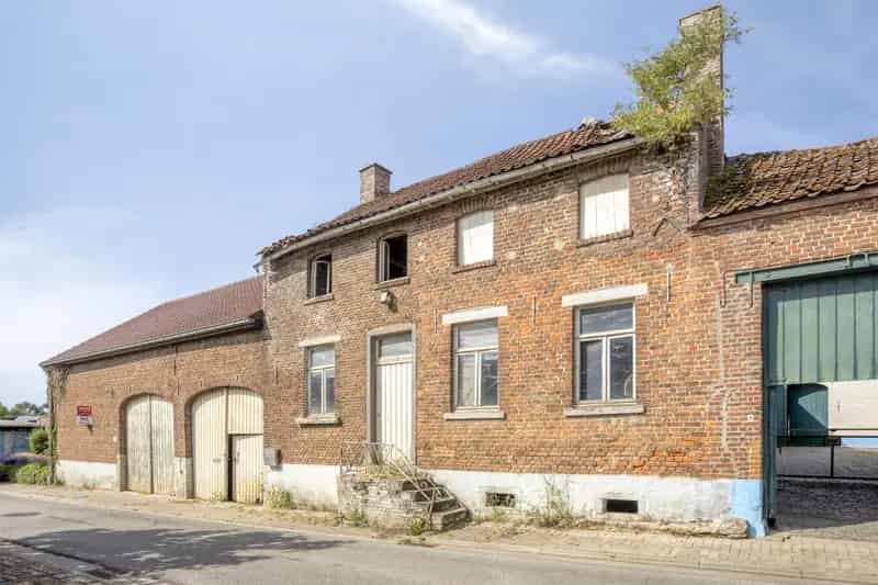 Huis te huur Boutersem: Charmante hoeve te renoveren met bijgebouwen