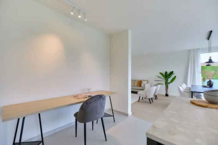 In Balegem-Dorp bouw Hectaar twee modern halfopen woningen.