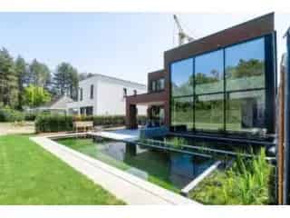 Villa te koop Beerse - Luxe woning met zwemvijver en duurzame energie