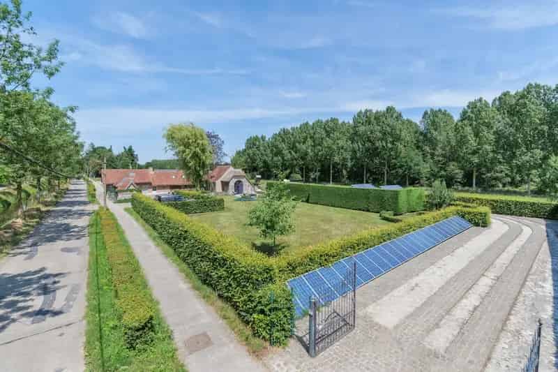 Huis te koop Lokeren: Ruime hoeve met 4 slaapkamers en 5000m² tuin