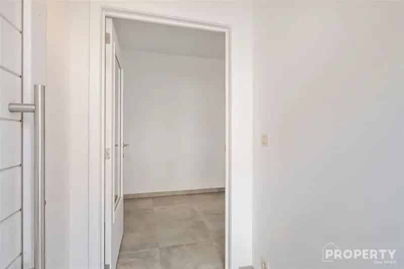 Huis te Huur Hulste: Gerenoveerde Rijwoning 3 slaapkamers Garage Terras