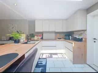 Huis te koop Lombardsijde - Instapklaar met garage en tuin