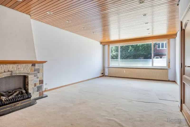 Halfopen bebouwing met 5 garageboxen te koop in Ham