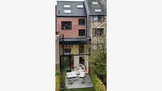 Te koop luxueus herenhuis met tuin in Leuven centrum