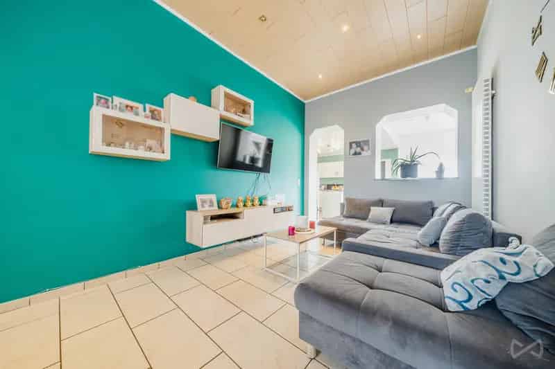 Huis te koop: Gezellige 3-gevel woning nabij winkels