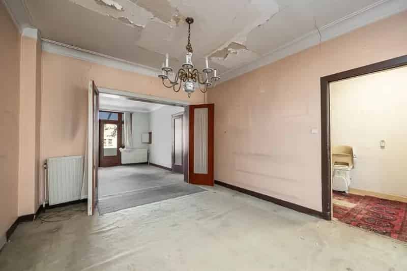 Woning met gigantisch magazijn te renoveren