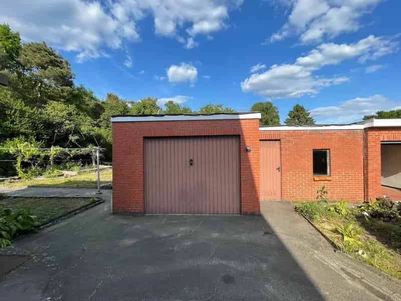 Huis te koop Genk 4 slaapkamers grote tuin te renoveren